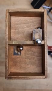 “The Wooden Ball Box Thingy”