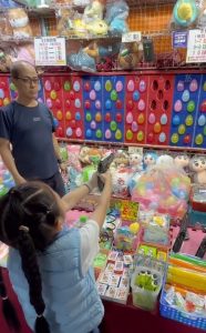 The carnival game owner definitely wasn't prepared for her