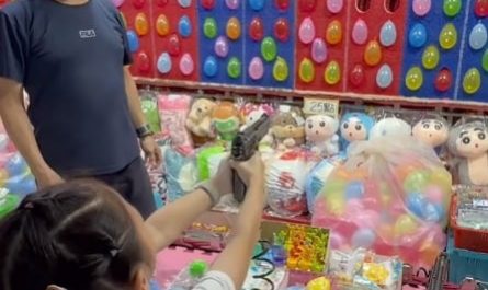 The carnival game owner definitely wasn't prepared for her