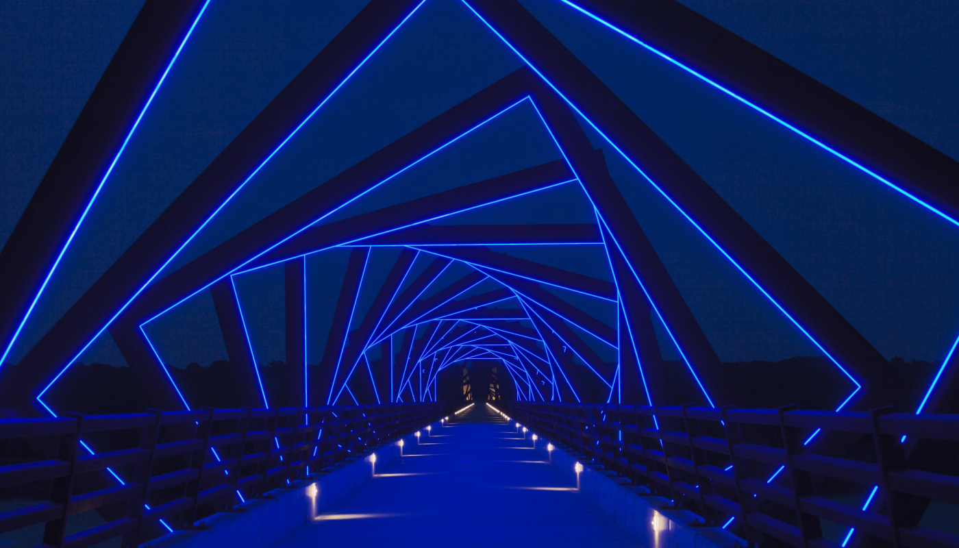The repeating arches of this illuminated bridge.
