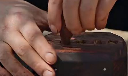 This man meticulously makes use of bamboo strands