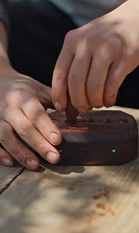 This man meticulously makes use of bamboo strands