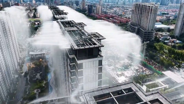 This neighborhood in China built a "rooftop rain" mist system that drops temps 5-8°C in minutes.