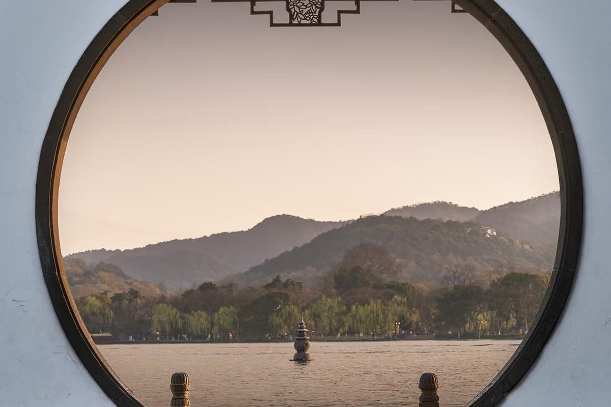 Traditional Chinese Moon gate by the West Lake, Hangzhou, China