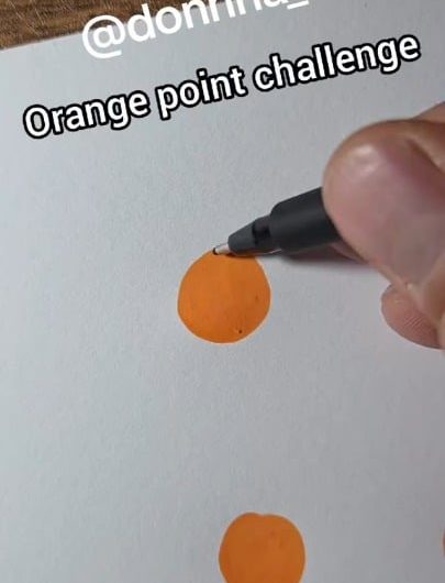 Transforming painted orange dots into simple illustrations