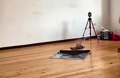 Using a drone to screw in a light bulb