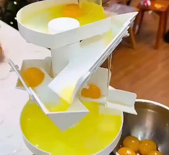 Watching egg yolks and whites part ways so perfectly.