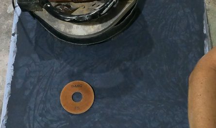 Wet grinding a concrete table top to expose and polish an intricate inlay - OC