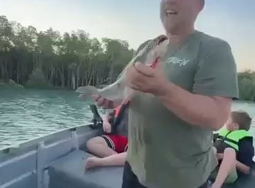 When a man notices an eagle eyeing the fish he just caught