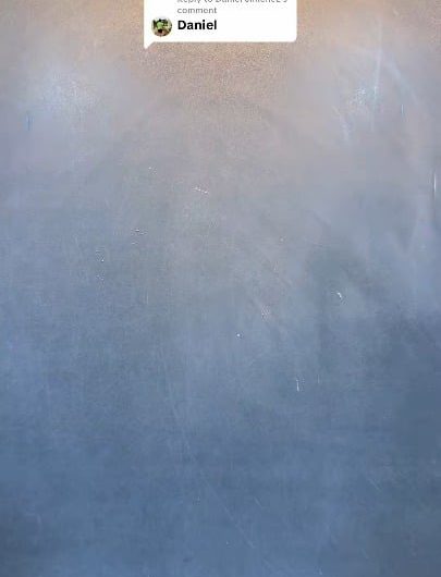 Writing the name “Daniel” out of fine marble dust using a utility blade