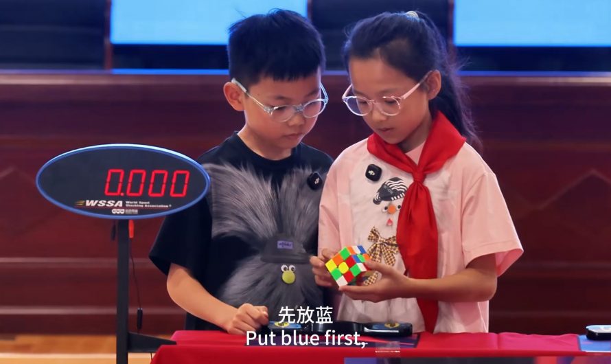Xuanyi Geng and Qixian Cao collaborate solve a Rubik’s Cube in under 9 seconds