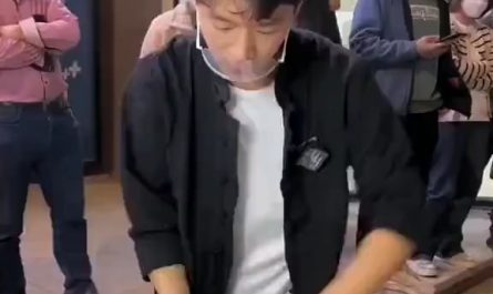 this cook is showing some serious acrobatic skills