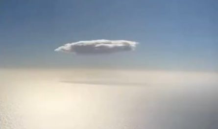 A single cloud wandering through the endless sky