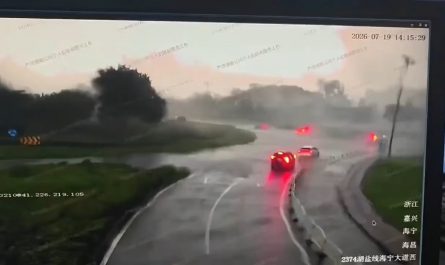 A tornado in Haining China, tosses a vehicle off the road.