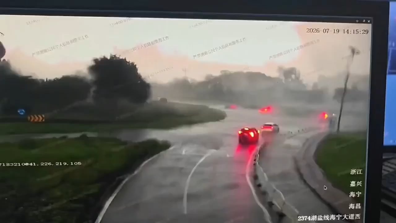 A tornado in Haining China, tosses a vehicle off the road.