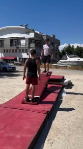 Acrobatics on a teeterboard