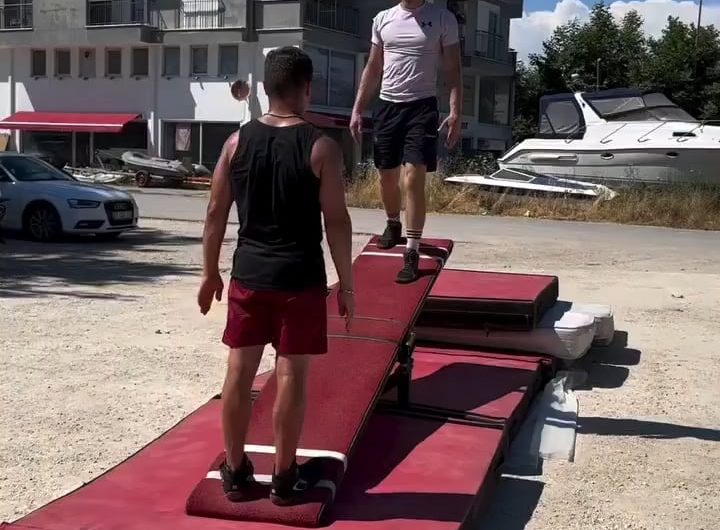 Acrobatics on a teeterboard