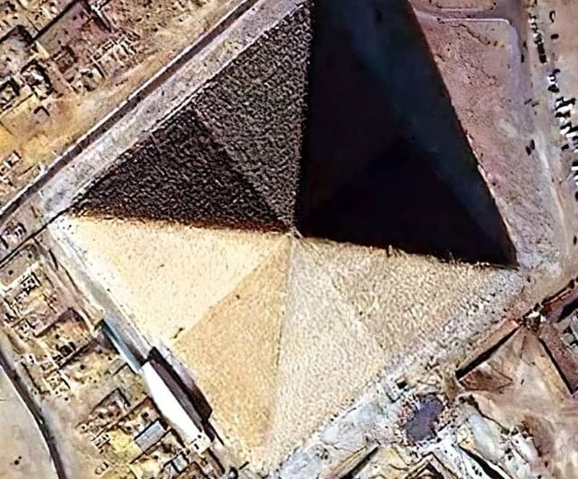 An incredible aerial perspective showing the subtle indentation that splits each of the Great Pyramid’s faces in two.