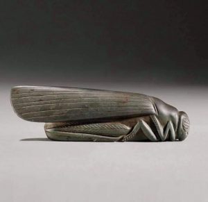 Ancient Babylonians carved standard weights into the shape of animals. This grasshopper-shaped one is nearly 3,800 years old