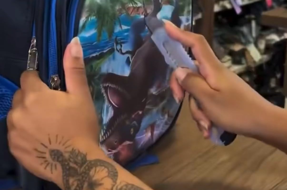 Chinese scammers put a film with a general print on schoolbags to fool customs, so the vendor can reveal the copyrighted content later