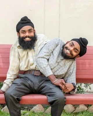 Sohna and Mohna Singh are conjoined twins from Punjab, India. Born in 2003 with two hearts and two pairs of arms but shared legs, liver, and gallbladder. They work as electricians for the Punjab State Power Corporation Limited.