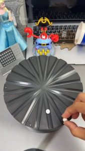 The effect created by these rolling balls
