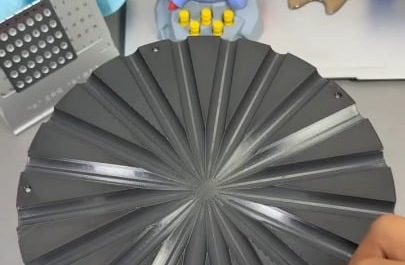The effect created by these rolling balls