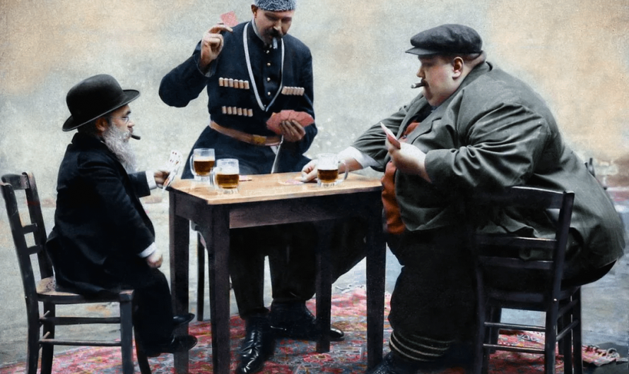 The tallest (Cornelius Bruns), shortest and fattest (Cannon Colossus) man of Europe playing a game of cards, 1913