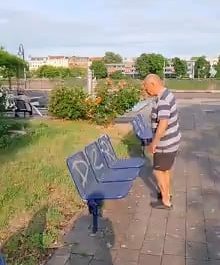 This old man doing a flawless front hand spring over a bus stop bench